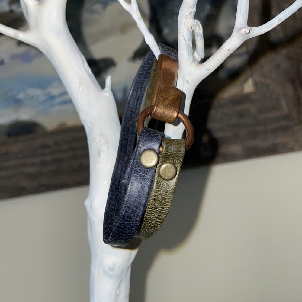 Leather fair trade bracelet with copper clasp.